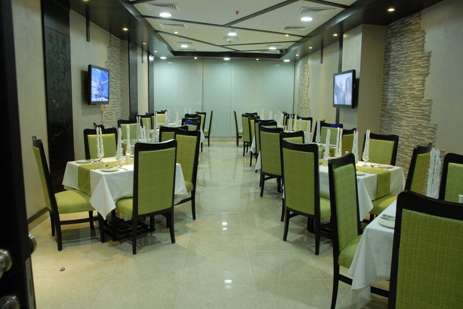 Al Hayat Hotel Suites Sardzsa Étterem fotó